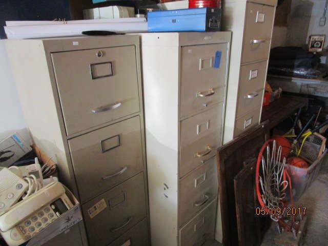 Several metal filing cabinets