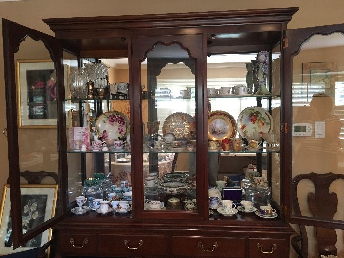 This china cabinet has a matching dining table and chairs