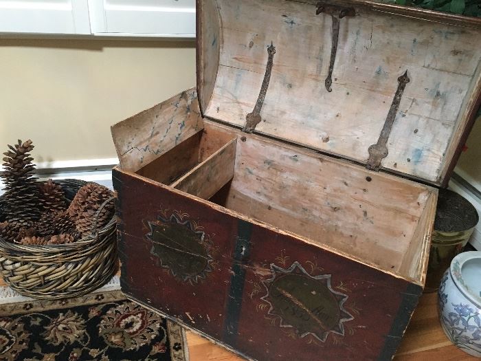 Even the hardware in this trunk is interesting, and the rosemaling on the front notes:  1855