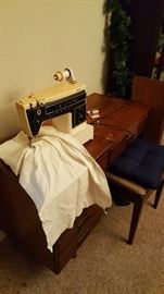 Sewing machine and cabinet.