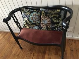 A sinewy black lacquer settee -a nice piece!