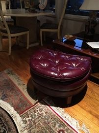 A tufted Hancock and Moore ottoman with beautiful burgundy leather