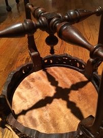 detail of figural walnut table