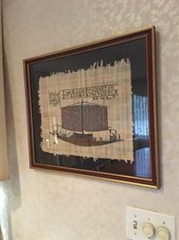 Egyptian hand painted papyrus of a ship[ framed under glass