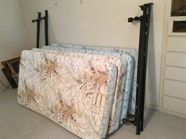 two twin beds and metal bed frames (ask to see as they may be in a closed off room)