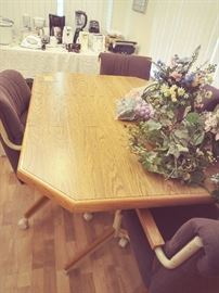 Dining room Table with Leaf and 4- Caster Chairs