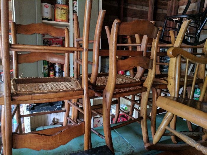 Eight beautiful cane-bottom dining chairs