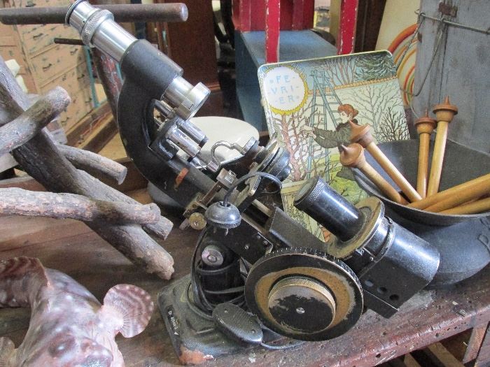Antique spittoon, Dog fish taxidermy, brass scope