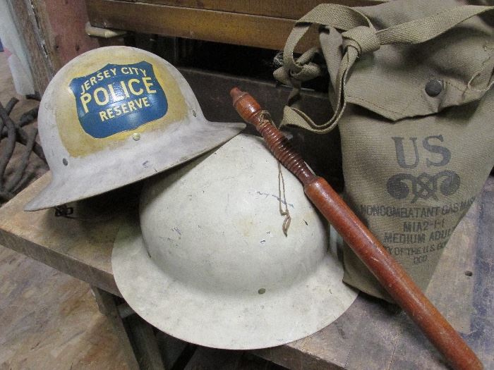 Vintage WWII 1940's Jersey City Civil Defense Reserve Police helmets, gas mask and walking club - for submarine Invasion patrol along the waterway with enforced black out times  
