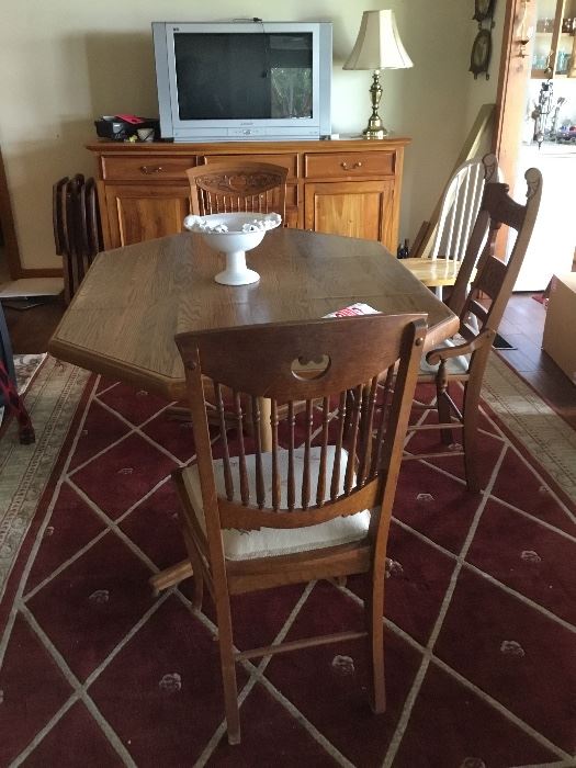 Kitchen table, three antique chairs priced separately. 