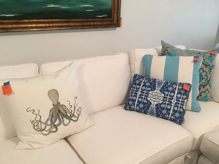 Throw pillows are priced separately or by the pair