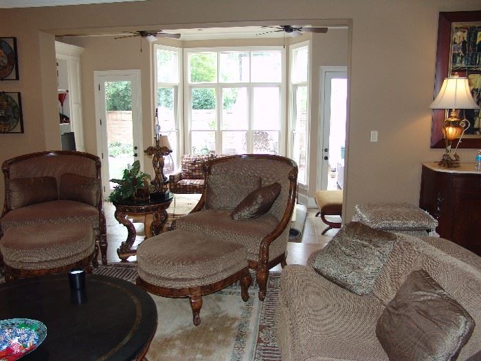 Pair upholstered chairs and ottomans