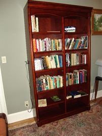 Bookcase with assortment of books