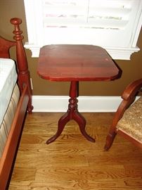 Antique cherry candlestick table