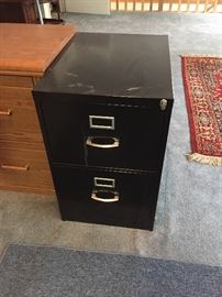 Two drawer black metal file cabinet with key $20