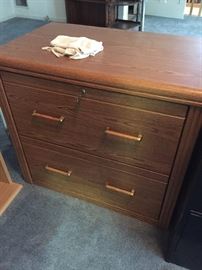 Oak lateral file cabinet two drawer with key $90