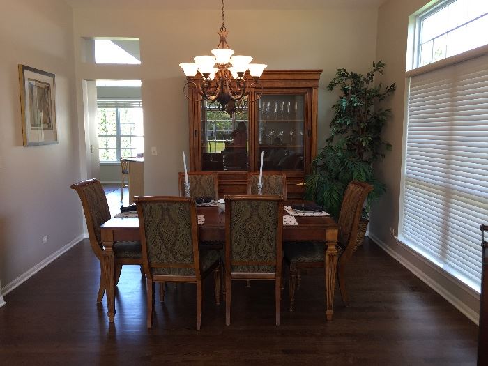 SOLD--- Dining room sets from the merchandise mart  China cabinet table with eight chairs and leave $ set