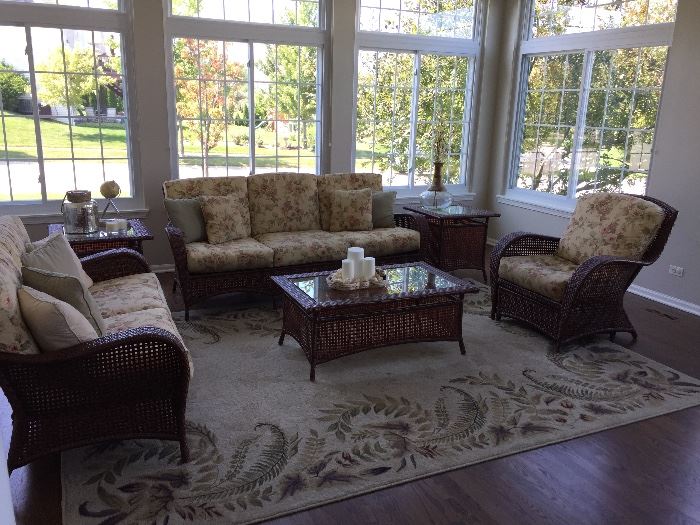 Sold---Wicker sunroom furniture sofa loveseat and tables coffee tables chair and ottoman from the merchandise Mart like new 