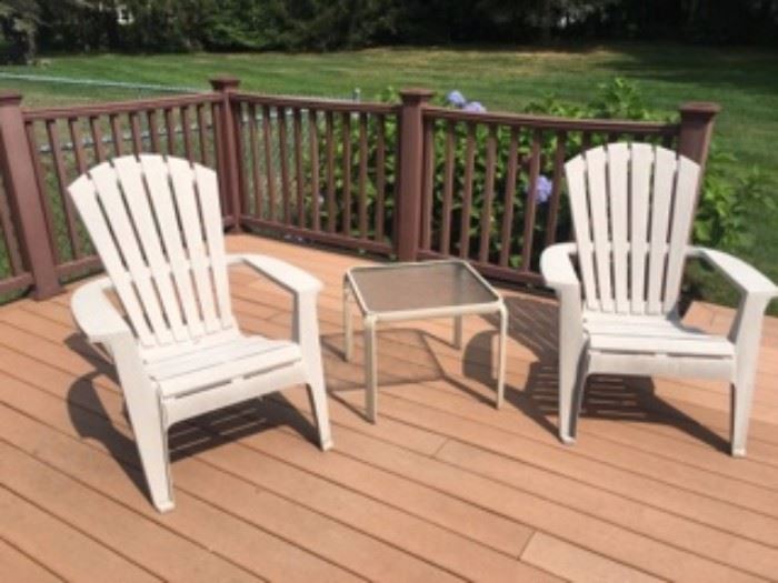 Plastic Adirondack Patio Chairs and Glass Side Table