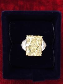 Internally flawless 10.88 Ct. yellow diamond                 by Lewis Glick. 18K and platinum.