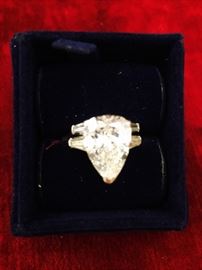 Platinum 5.60 Ct. Pear shaped brilliant cut diamond ring 