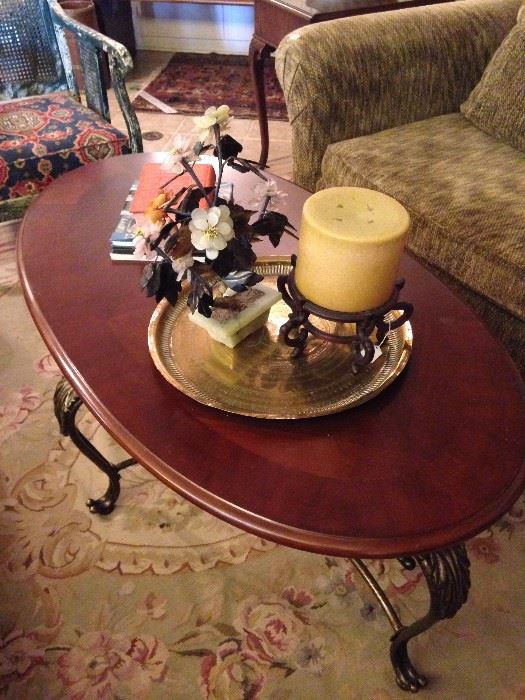 Oval coffee table and Asian stone-carved floral arrangement