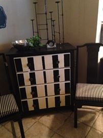 Darling striped chest; black chairs with black & white cushions