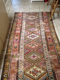 Terracotta/green/gold 3  1/2 feet x 7  1/2 feet rug