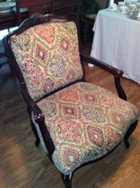 One of two matching arm chairs