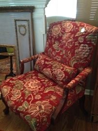 Fine-looking upholstered reds/golds arm chair