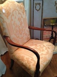 Antique arm chair with peach Asian print material