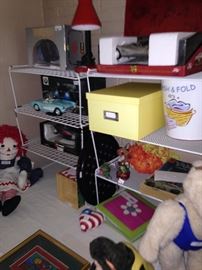 Raggedy Ann, model cars, and other toys