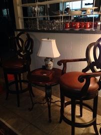 Good-looking matching bar stools; small side table