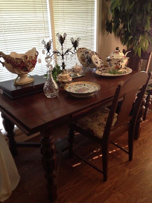 Antique English oak draw leaf dining table with six chairs