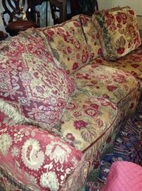 Very comfortable reds/golds sofa with washable cover