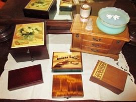Wooden jewelry boxes, some musical