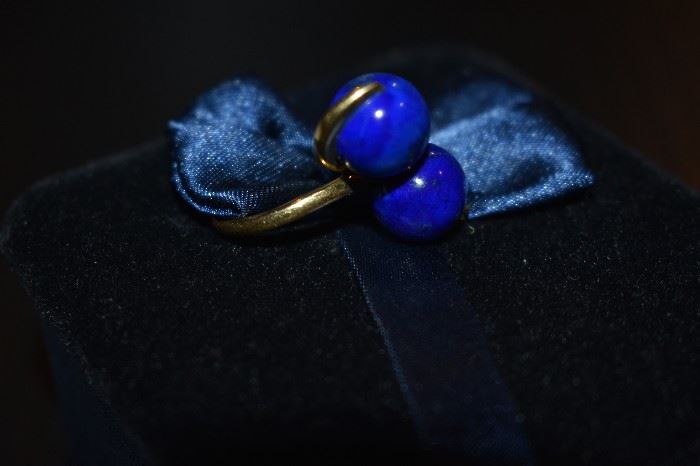 1) Lazuli Ring - One ladies 18kt yellow gold bypass style ring mounting weighing approx. 5.06dwt and is set with two (2) round lapis lazuli beads each measuring approx. 11mm in diameter.