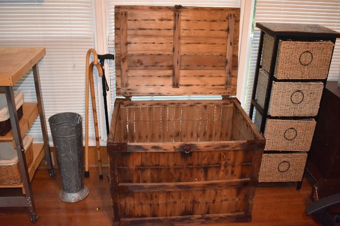 Antique Wooden Box with lettering Front and Back that say "McKenzie Laundry Company" plus walking canes, umbrella stand and basket organizer unit