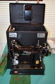 Antique Singer Portable Electric Sewing Machine Model 221-1 This machine is in Awesome Condition to the point of appearing to have never been used!