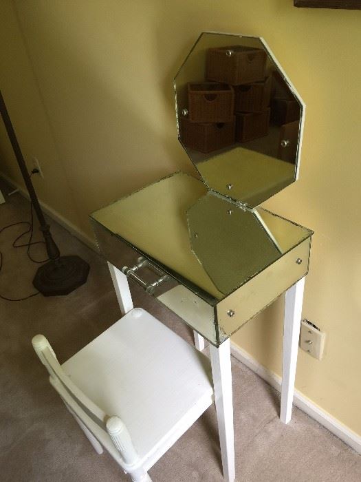 Dressing table with mirrored surfaces