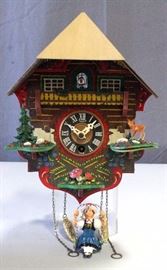German Black Forest Painted Cuckoo Clock, 8"W x 10"H, Includes Key and Woman on Swing Figure