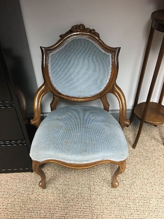 Several reproduction shield back chairs with blue upholstery. 