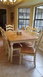 Kitchen table with six chairs and extra leaf