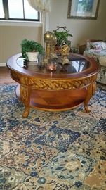 Round glass and wood coffee table