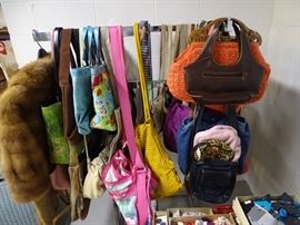 Many designer purses for sale.