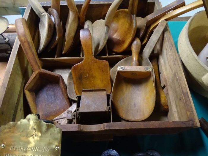 Group of antique wooden scoops, butter paddles, etc.