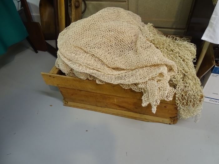 Wooden box with fish net.