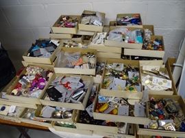 Boxes of broken jewelry for crafts.