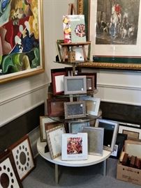 Multi-tier round display with an assortment of custom frames