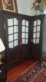 Antique corner armoire from Belgium.